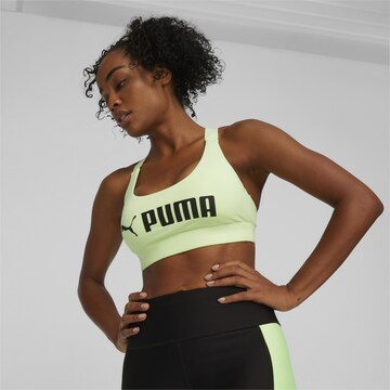 PUMA Bustier Biustonosz sportowy w kolorze zielony