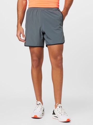 UNDER ARMOUR Regular Workout Pants in Grey: front