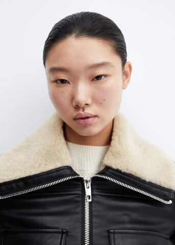 MANGO Übergangsjacke 'survive' in Schwarz