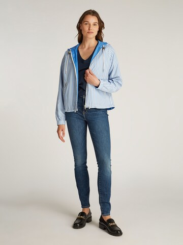TOMMY HILFIGER Tussenjas in Blauw