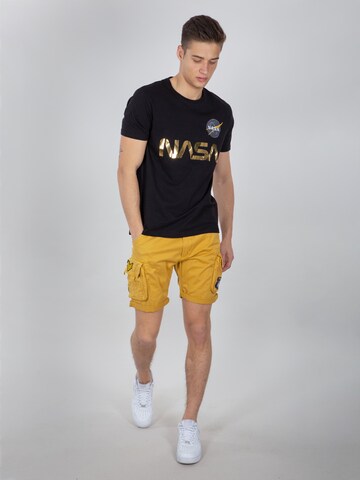 ALPHA INDUSTRIES - regular Pantalón cargo en amarillo