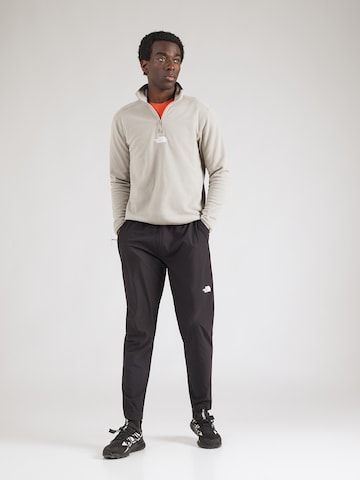 Coupe slim Pantalon de sport 'MOUNTAIN ATHLETICS USHBA' THE NORTH FACE en noir