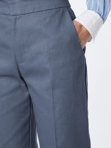 Edikted Loosefit Kalhoty s puky – modrá