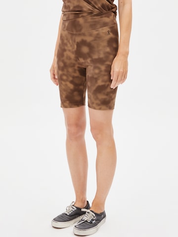Regular Leggings 'Nedaa Autumn Garden' ARMEDANGELS en marron : devant