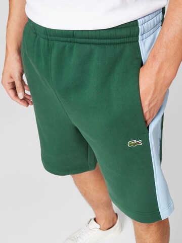 LACOSTE Regular Trousers in Green