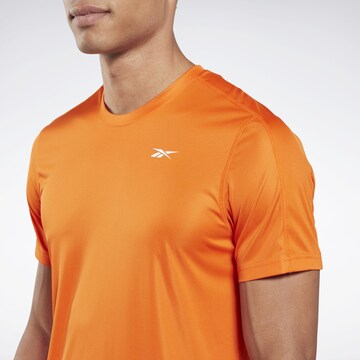 T-Shirt fonctionnel Reebok en orange