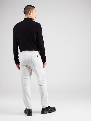 pilka ALPHA INDUSTRIES Siaurėjantis Kelnės