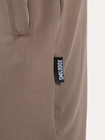 Smilodox Regular Sports trousers in Beige