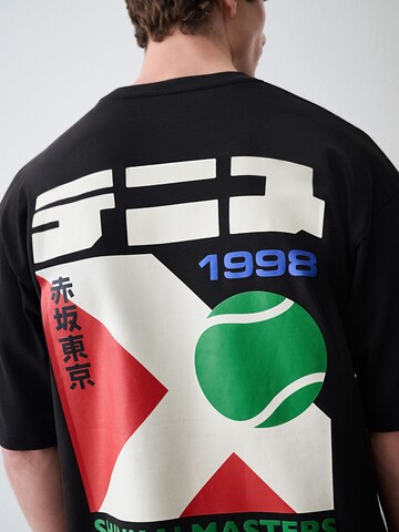T-Shirt Next en noir
