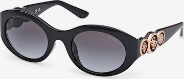 Lunettes de soleil GUESS en noir : devant