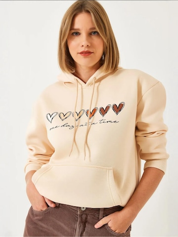 Felpa di Bianco Lucci in beige: frontale