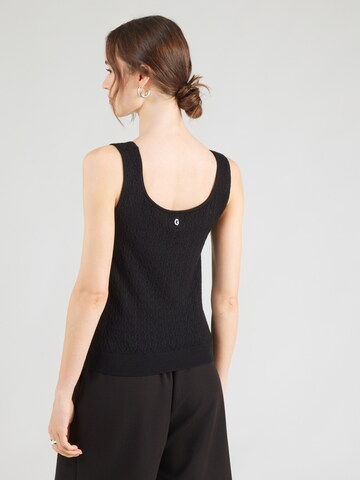 Top in maglia 'NINA' di GUESS in nero