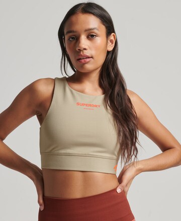 Bustier Soutien-gorge de sport Superdry en beige : devant