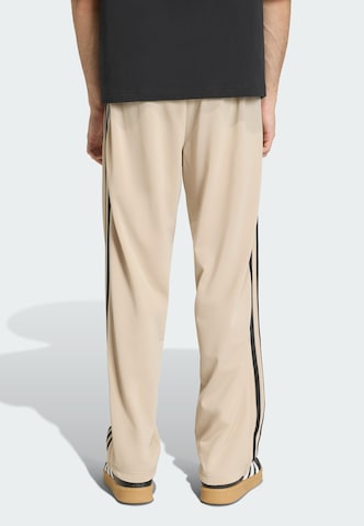 regular Pantaloni 'Firebird' di ADIDAS ORIGINALS in verde