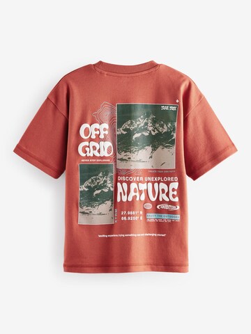 Tricou de la Next pe roșu