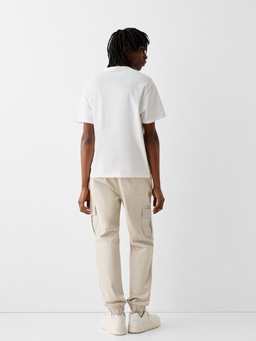 Bershka Tapered Hose in Beige