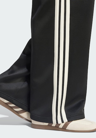 ADIDAS SPORTSWEAR Baggy Спортен панталон 'Stadium' в черно