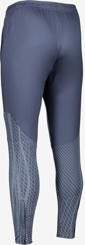 Coupe slim Pantalon de sport NIKE en bleu