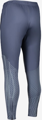NIKE Slim fit Workout Pants in Blue