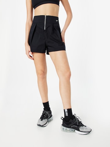 Nike Sportswear Regular Pleat-front trousers in Black: front