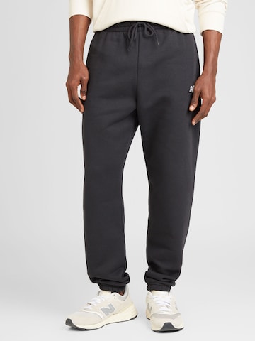 new balance Tapered Trousers in Black: front