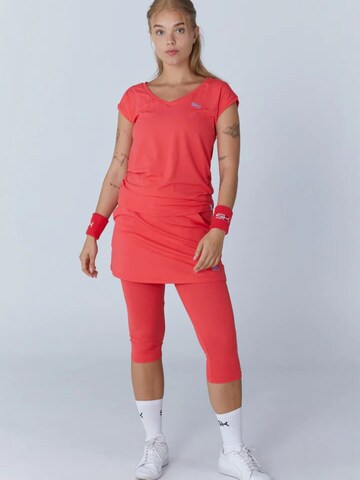 Maglia funzionale 'Loose Fit V-Neck' di SPORTKIND in arancione: frontale