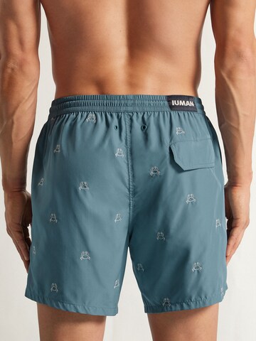 IUMAN Intimissimi Board Shorts in Blue