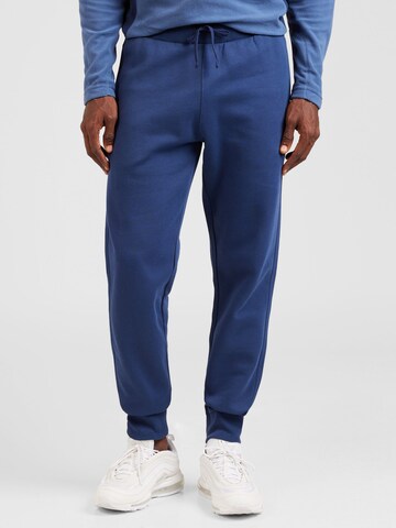 Champion Authentic Athletic Apparel Tapered Nadrág - kék: elől