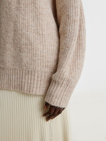 Pullover extra large 'Luca' di EDITED in beige