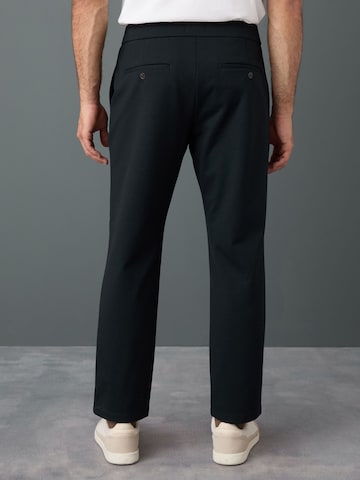 Next Slimfit Spodnie w kant w kolorze niebieski