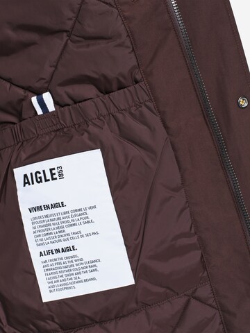 Parka d’hiver AIGLE en rouge : au dessus
