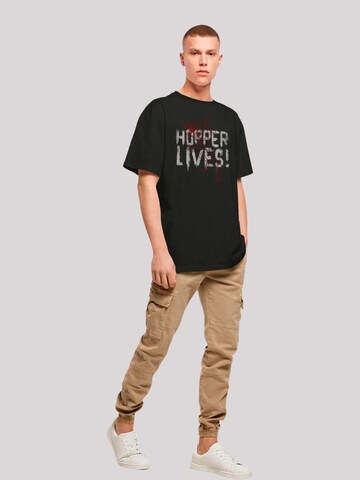 T-Shirt 'Stranger Things Hoppers Live Netflix TV Series' F4NT4STIC en noir