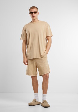 regular Pantaloni di Urban Classics in beige