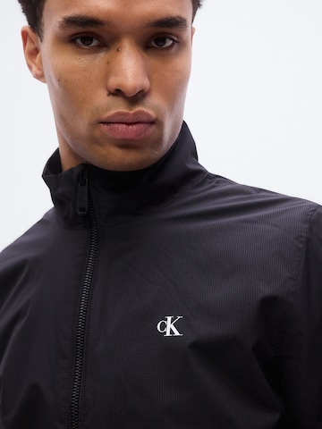 Calvin Klein Jeans Демисезонная куртка в Черный
