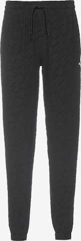 PUMA - Tapered Pantalón deportivo en negro: frente