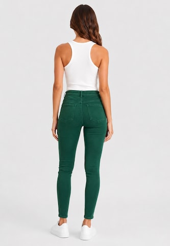 Slimfit Jeans di Elara in verde