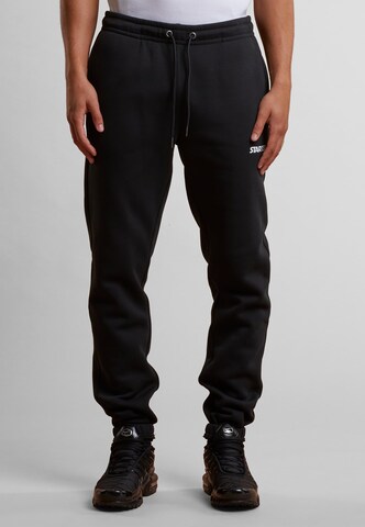 Starter Black Label Tapered Trousers 'Essential' in Black: front
