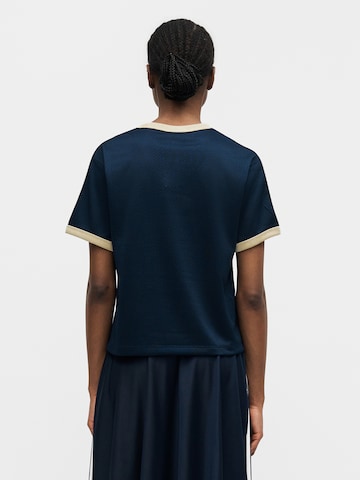 ADIDAS ORIGINALS - Camisa 'Linear' em azul