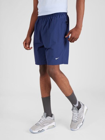 Regular Pantalon 'Solo' Nike Sportswear en bleu : devant