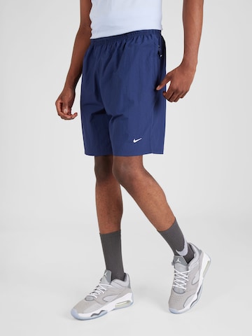 Regular Pantaloni 'Solo' de la Nike Sportswear pe albastru: față