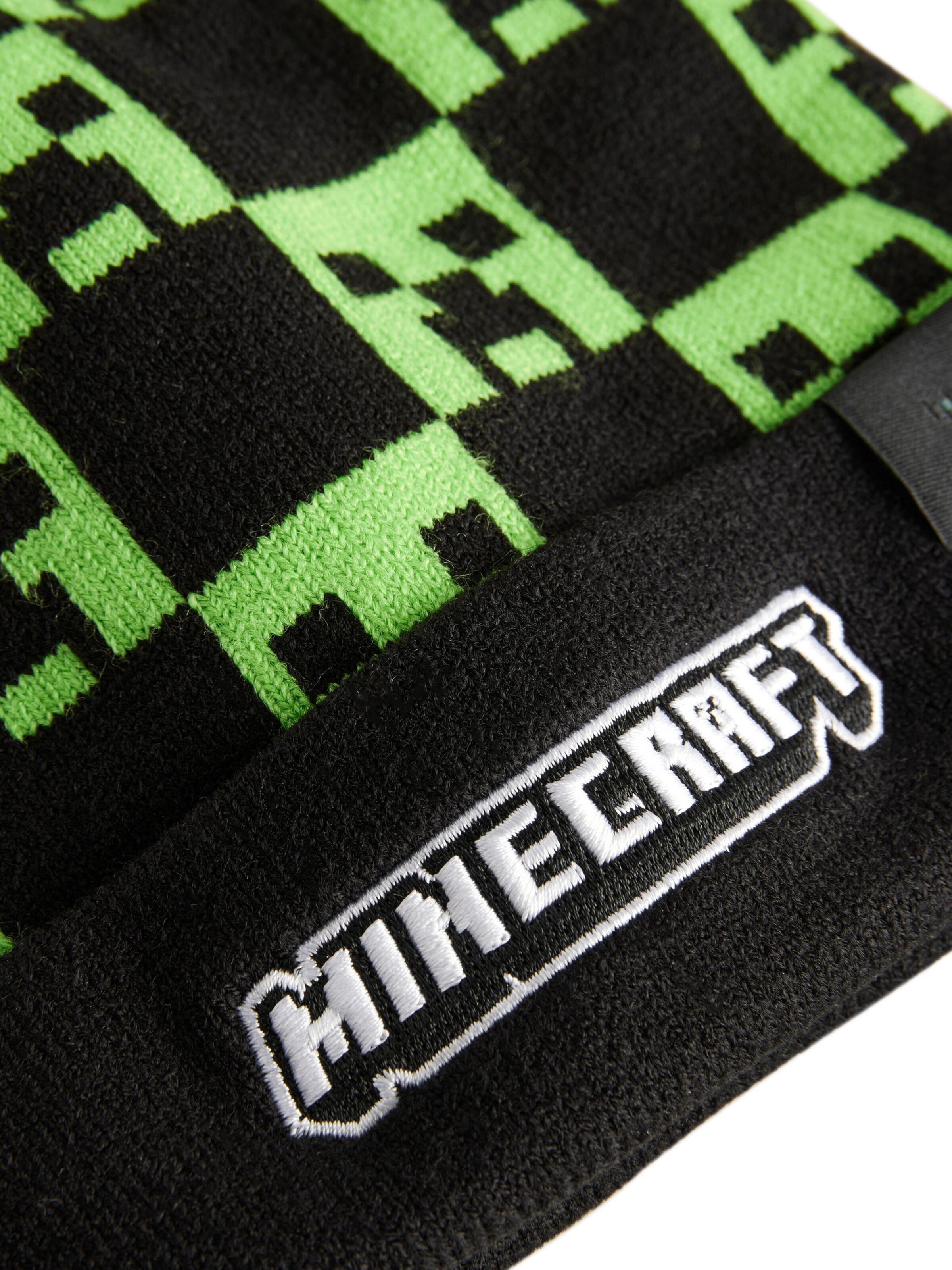 juoda Next Megzta kepurė