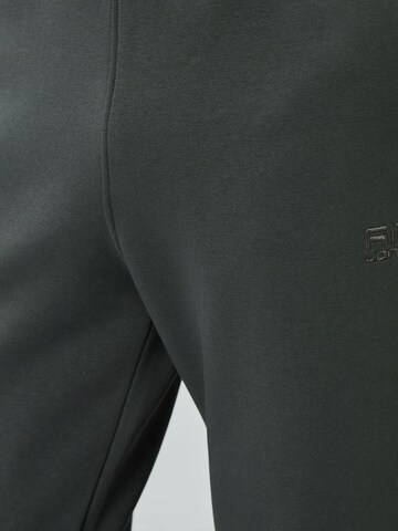 Completo per l'allenamento di Tommy Life in verde