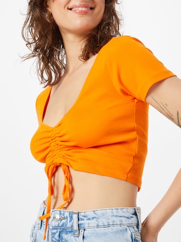 ONLY - Camiseta 'KIKA' en naranja