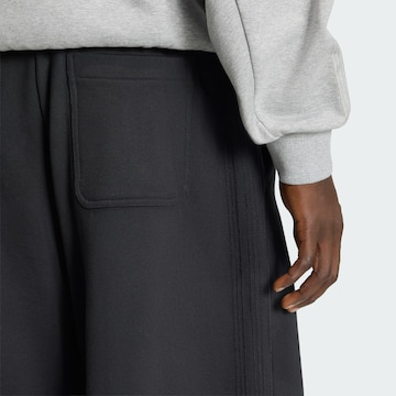 Loosefit Pantalon 'Premium Essentials' ADIDAS ORIGINALS en noir