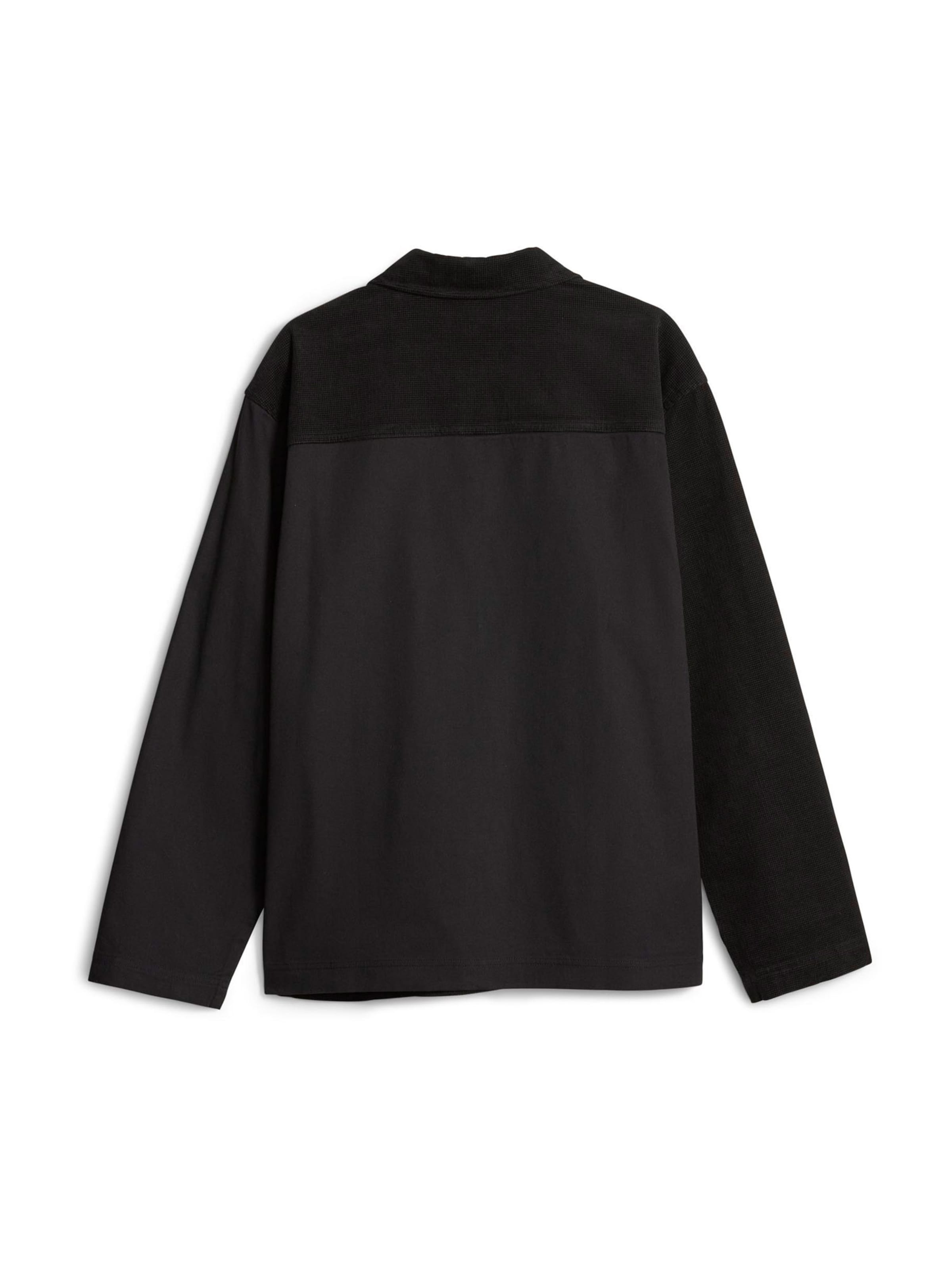 PUMA Comfort fit Prehodna jakna 'Downtown' | črna barva