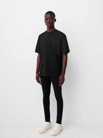Bershka Skinny Jeans in Schwarz