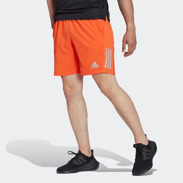 ADIDAS SPORTSWEAR Regular Workout Pants 'Own the Run' in Orange: front