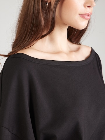 ABOUT YOU - Camiseta 'Irem' en negro