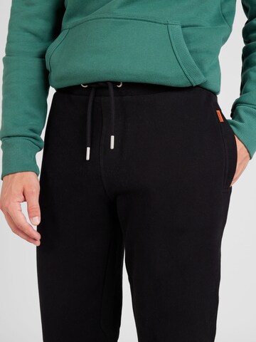 Tapered Pantaloni 'Essential' di Superdry in nero