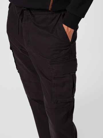s.Oliver Loose fit Trousers in Black